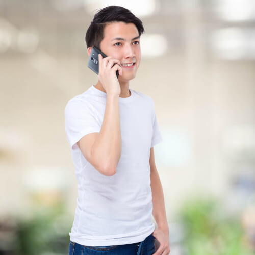 Man on phone with financial planner.