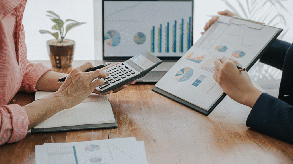 Financial advisor reviewing investment performance with client