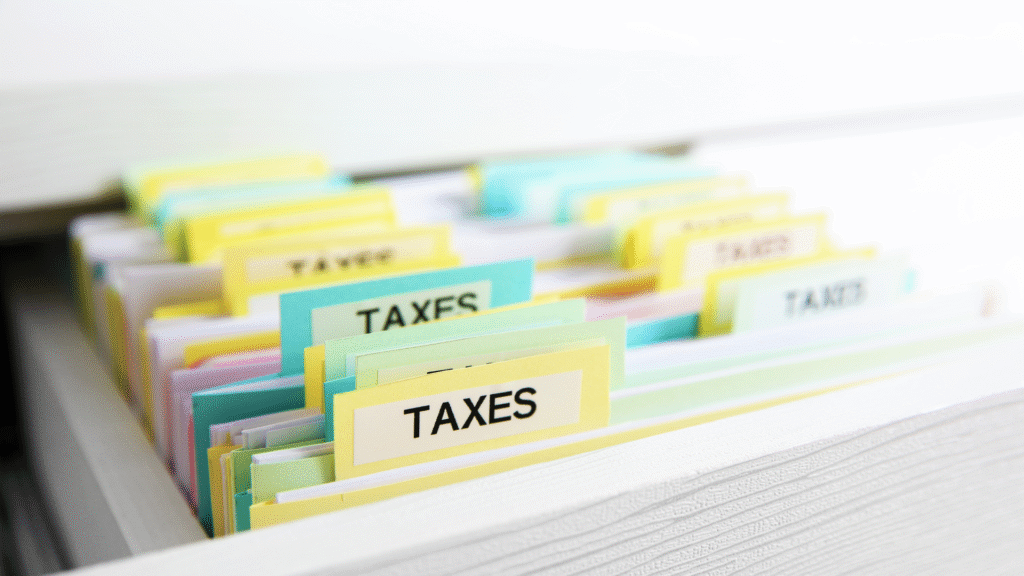 Organized tax documents in folders for planning and payments