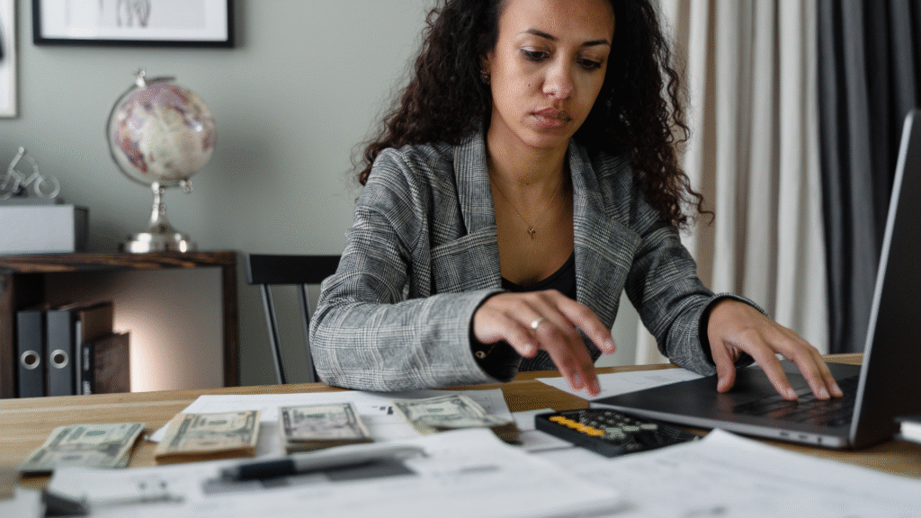 Woman managing finances and planning how to tackle debt efficiently