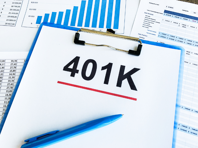Financial charts and 401(k) paperwork for retirement planning guide