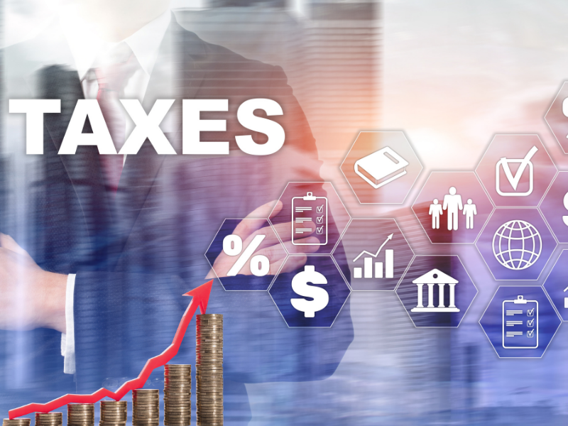 Financial planning concept with taxes, investment icons, and rising coins representing Roth IRA growth.