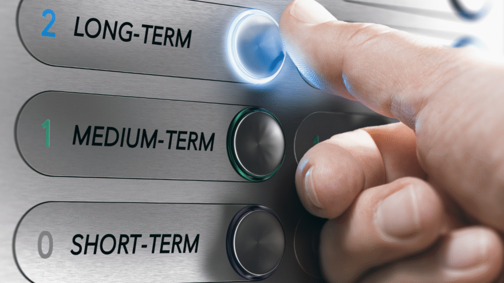 Finger pressing long-term option button on a control panel