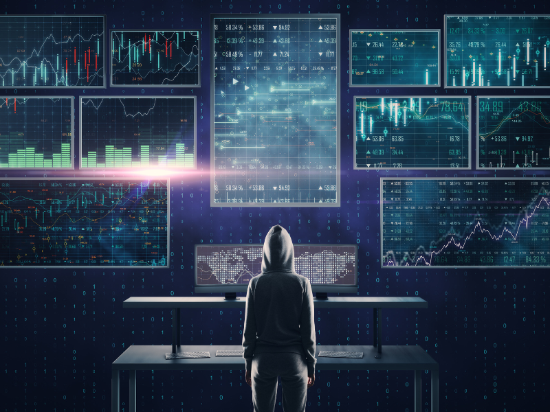 Top 10 tips to protect yourself from online scammers with person viewing multiple computer screens showing cybersecurity and scam detection data