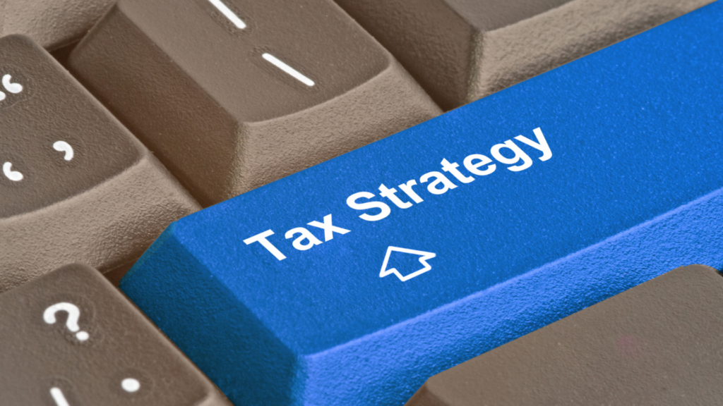 Tax strategy planning concept with keyboard key labeled professional tax advice
